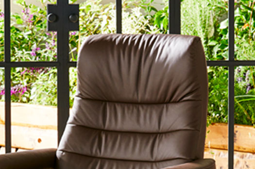 Stressless opal large leather reclining chair and ottoman in brown by stressless deals
