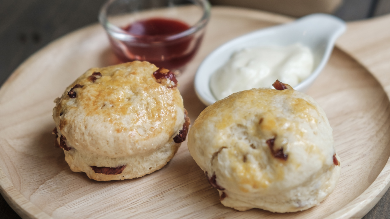 raisin scones with jam and cream