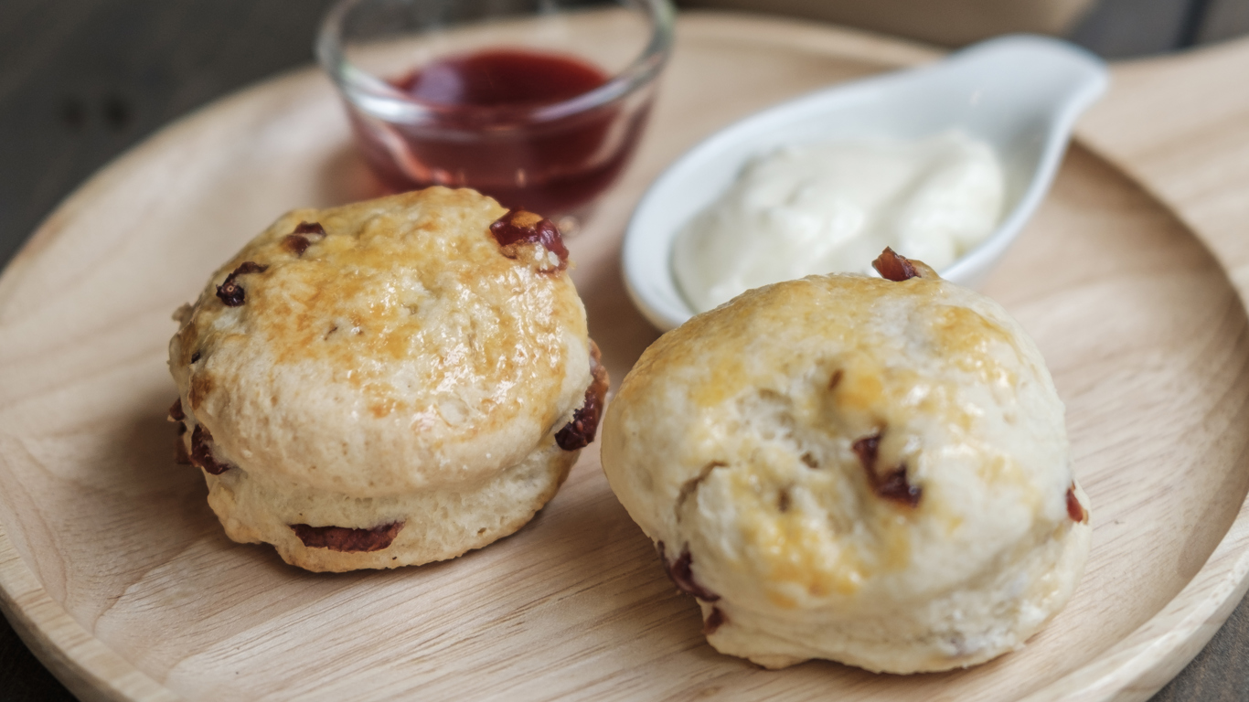 raisin scones with jam and cream